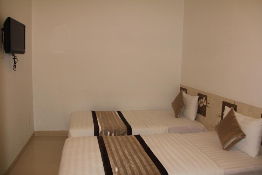 New Sunny Hotel Ho Si Minh-város Szoba fotó